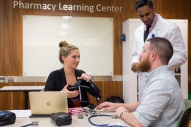 UW School of Pharmacy’s class of 2016 worked hard to earn the No. 1 initial pass rate on the NAPLEX in the U.S.