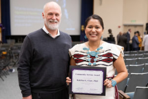 Ken Thummel, Milo Gibaldi Endowed Chair of the Department of Pharmaceutics, with Katrina Claw who was honored for her service to the community at the 2019 Martin Luther King Tribute