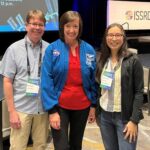 Ed Kelly (left) and Cathy Yeung (right) with Astronaut Megan McArthur (center) at this year’s ISSRDC meeting
