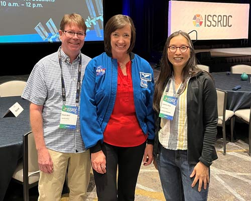 Ed Kelly (left) and Cathy Yeung (right) with Astronaut Megan McArthur (center) at this year’s ISSRDC meeting