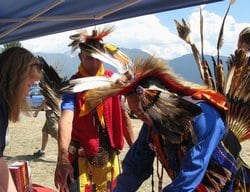 American Indians receive research information at a powwow on the Flathead Reservation in Montana, summer 2009
